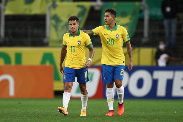 Phillipe Coutinho And Roberto Firmino best friends in football SAO PAULO, BRAZIL - OCTOBER 09: Philippe Coutinho of Brazil celebrates with Roberto Firmino after scoring the fifth goal during a match between Brazil and Bolivia as part of South American Qualifiers for Qatar 2022 at Neo Quimica Arena on October 09, 2020 in Sao Paulo, Brazil.