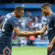 Kylian Mbappé and Achraf Hakimi best friendships in football PARIS, FRANCE - SEPTEMBER 11: Kylian Mbappe of PSG celebrates his goal with Achraf Hakimi of PSG during the Ligue 1 Uber Eats match between Paris Saint-Germain (PSG) and Clermont Foot 63 at Parc des Princes on September 11, 2021 in Paris, France.
