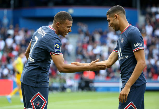 Kylian Mbappé and Achraf Hakimi best friendships in football PARIS, FRANCE - SEPTEMBER 11: Kylian Mbappe of PSG celebrates his goal with Achraf Hakimi of PSG during the Ligue 1 Uber Eats match between Paris Saint-Germain (PSG) and Clermont Foot 63 at Parc des Princes on September 11, 2021 in Paris, France.
