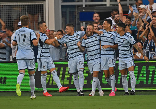 Sporting Kansas CityKANSAS CITY, KS - AUGUST 26:  Daniel Salloi #20 of Sporting Kansas City celebrates with his teammates after scoring a goal in the first half against the San Jose Earthquakes on August 26, 2023 at Children's Mercy Park in Kansas City, Kansas.