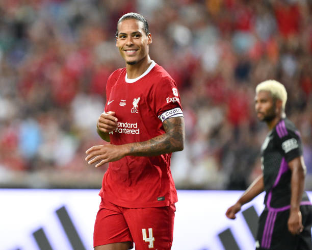 Virgil van Dijk best defenders in the world SINGAPORE, SINGAPORE - AUGUST 2: Virgil van Dijk of Liverpool FC celebrates scoring his side's goal during the pre-season friendly match between Liverpool and Bayern Muenchen at the National Stadium on August 2, 2023 in Singapore.