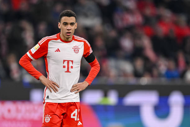 Jamal Musiala best soccer players under 25 MUNICH, GERMANY - FEBRUARY 24: Jamal Musiala of Bayern Muenchen looks on during the Bundesliga match between FC Bayern München and RB Leipzig at Allianz Arena on February 24, 2024 in Munich, Germany.