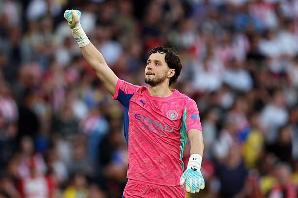 LONDON, ENGLAND - APRIL 25: James Trafford of Manchester City acknowledges the fans following victory during the Emirates FA Cup Semi Final match between Manchester City and Southampton at Wembley Stadium on April 25, 2026 in London, England