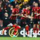 AFC Bournemouth soccer clubs that are sponsored by Umbro Bournemouth's Uruguayan defender Matias Vina (C) celebrates with teammates after scoring his team's first goal during the English Premier League football match between Bournemouth and Chelsea at the Vitality Stadium in Bournemouth, southern England on May 6, 2023.