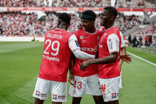 Stade De Reims soccer teams that are sponsored by Umbro Reims' Malian defender Cheick Keita (C) celebrate his team's first goal with teamates during the French L1 football match between Stade de Reims and Montpellier Herault SC at Stade Auguste-Delaune in Reims, northern France on June 3, 2023.