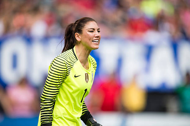 Hope Solo best US women's soccer players of all time CLEVELAND, OH - JUNE 5: Goal keeper Hope Solo #1 celebrates with Julie Johnston #8 of U.S. Women's National Team during the second half of a friendly match against Japan on June 5, 2016 at FirstEnergy Stadium in Cleveland, Ohio.