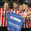 Sheffield United newly promoted EPL teams for the 2023/24 season APRIL 26: Sander Berge, Chris Basham, Billy Sharp and John Egan of Sheffield United celebrate promotion to the premier league after the Sky Bet Championship between Sheffield United and West Bromwich Albion at Bramall Lane on April 26, 2023 in Sheffield, United Kingdom.