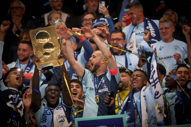 Le Havre AC newly promoted Ligue 1 teams 2023/24 Le Havre's players celebrate with the trophy for French L2 championship after the football match between Le Havre AC and Dijon FCO at Oceane Stadium in Le Havre on June 2, 2023.