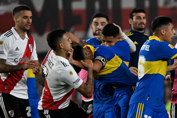 Boca Juniors vs. River Plate best soccer rivalries in history River Plate's forward Matias Suarez (2nd-L) fight with Boca Juniors' midfielder Guillermo Fernandez (C) during their Argentine Professional Football League Tournament 2023 match at El Monumental stadium in Buenos Aires on May 7, 2023.