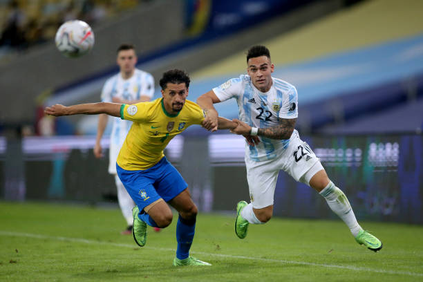 Brazil vs. Argentina best Soccer rivalries in history RIO DE JANEIRO, BRAZIL - JULY 10: Lautaro Martinez of Argentina competes for the ball with Marquinhos of Brazil ,during the Final Match of Copa America Brazil 2021 between Brazil and Argentina at Maracana Stadium on July 10, 2021 in Rio de Janeiro, Brazil.
