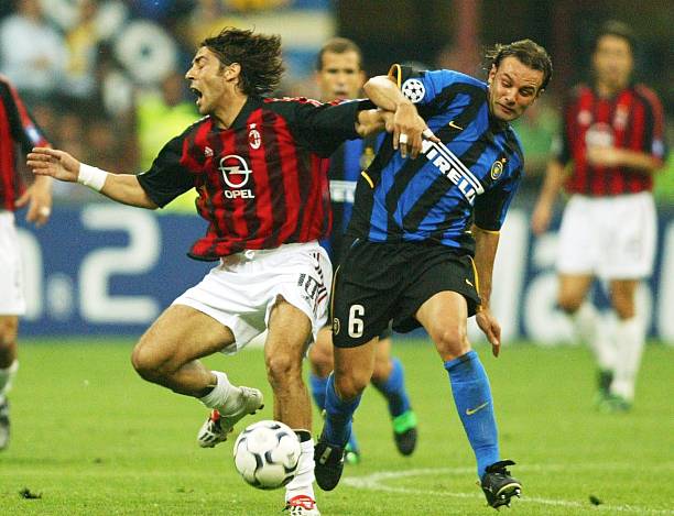 AC Milan vs. Inter Milan best rivalries in soccer history MILAN, ITALY - MAY 13: Champions League 02/03, Mailand; Inter Mailand - AC Mailand; Rui COSTA/AC Mailand, Cristiano ZANETTI/Inter