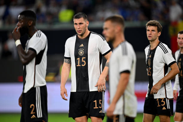 Euro 2024: Can Germany Rise From The Rubble? WOLFSBURG, GERMANY - SEPTEMBER 09: Niklas Suele of Germany looks dejected after the team's defeat in the international friendly match between Germany and Japan at Volkswagen Arena on September 09, 2023 in Wolfsburg, Germany.