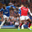 LIVERPOOL, ENGLAND - SEPTEMBER 17: Abdoulaye Doucoure of Everton and Eddie Nketiah of Arsenal during the Premier League match between Everton FC and Arsenal FC at Goodison Park on September 17, 2023 in Liverpool, United Kingdom.