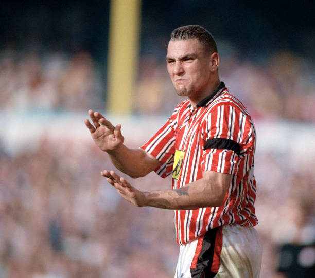 Vinnie Jones most aggressive soccer players of all time LONDON, ENGLAND - OCTOBER 20: Vinnie Jones of Sheffield United reacts during the Barclays League Division One match between Tottenham Hotspur and Sheffield United at White Hart Lane on October 20, 1990 in London, England.