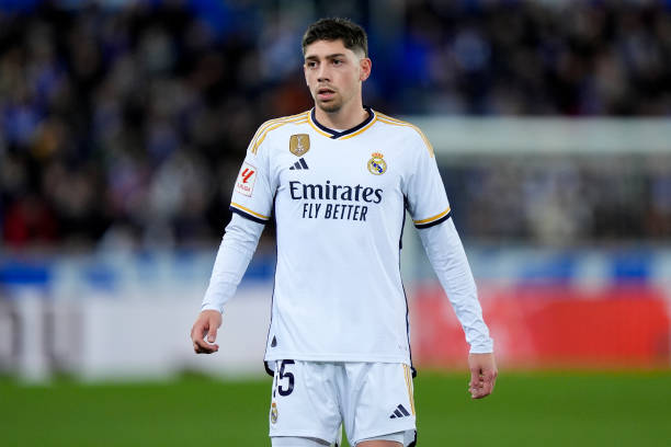 Federico Valverde best central midfielders in the world VITORIA-GASTEIZ, SPAIN - DECEMBER 21: Federico Valverde of Real Madrid CF looks on during the LaLiga EA Sports match between Deportivo Alaves and Real Madrid CF at Estadio de Mendizorroza on December 21, 2023 in Vitoria-Gasteiz, Spain. 