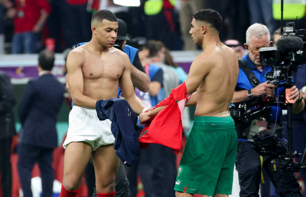 Why do soccer players swap Jerseys? AL KHOR, QATAR - DECEMBER 14: Kylian Mbappe of France and his friend Achraf Hakimi of Morocco exchanging their jersey following the FIFA World Cup Qatar 2022 semifinal match between France and Morocco at Al Bayt Stadium on December 14, 2022 in Al Khor, Qatar. 