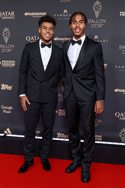 Guéla Doué (Ivory Coast) and Désiré Doué football brothers different ational teams PARIS, FRANCE - SEPTEMBER 22: Désiré Doué and Guéla Doué attend the 69th Ballon D'Or Photocall at Theatre Du Chatelet on September 22, 2025 in Paris, France. 