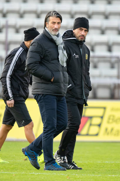 LAUSANNE, SWITZERLAND - NOVEMBER 10: Head Coach Murat Yakin of FC Schaffhausen and Assistant Coach Hakan Yakin of FC Schaffhausen look on during the Challenge League game between FC Lausanne-Sport and FC Schaffhausen at Stade Olympique de la Pontaise on November 10, 2019 in Lausanne, Switzerland.