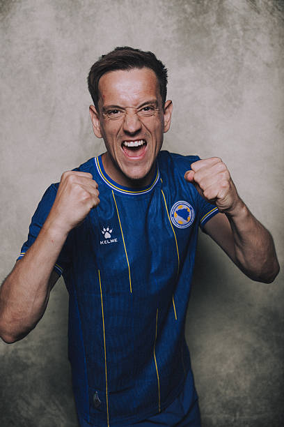 TORONTO, ONTARIO - JUNE 08: (EXCLUSIVE COVERAGE) (EDITOR'S NOTE: This image has been digitally altered.) Amir Hadziahmetovic #16 of Bosnia and Herzegovina poses for a portrait during the official FIFA World Cup 2026 portrait session on June 08, 2026 in Toronto, Ontario.