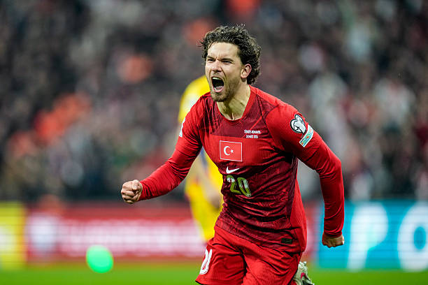 Ferdi Kadioglu of Turkey celebrates his team's first goal during the FIFA World Cup 2026 European Qualifiers play-off semi-final match between Turkey and Romania at Tupras Stadium on March 26, 2026, in Istanbul, Turkey.