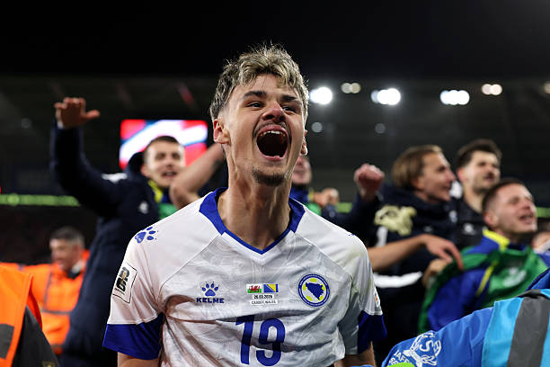 CARDIFF, WALES - MARCH 26: Kerim Alajbegovic of Bosnia and Herzegovina celebrates after winning in the penalty shoot out in the FIFA World Cup 2026 European Qualifiers KO play-off match between Wales and Bosnia and Herzegovina at Cardiff City Stadium on March 26, 2026 in Cardiff, Wales. 