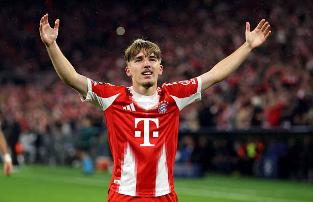 MUNICH, GERMANY - OCTOBER 22: Lennart Karl of Bayern Munich celebrates scoring his team's first goal during the UEFA Champions League 2025/26 League Phase MD3 match between FC Bayern München and Club Brugge KV at Football Arena Munich on October 22, 2025 in Munich, Germany. 