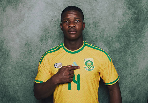 PACHUCA, MEXICO - JUNE 05: (EXCLUSIVE COVERAGE) (EDITOR'S NOTE: This image has been digitally altered.) Mbekezeli Mbokazi #14 of South Africa poses during the official FIFA World Cup 2026 portrait session on June 05, 2026 in Pachuca, Mexico.