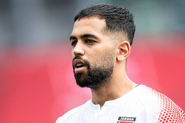 Jordan's forward #9 Ali Olwan looks on before a friendly match between Switzerland and Jordan ahead of the 2026 FIFA World Cup football tournament at the Kybunpark stadium, in St. Gallen on May 31, 2026.