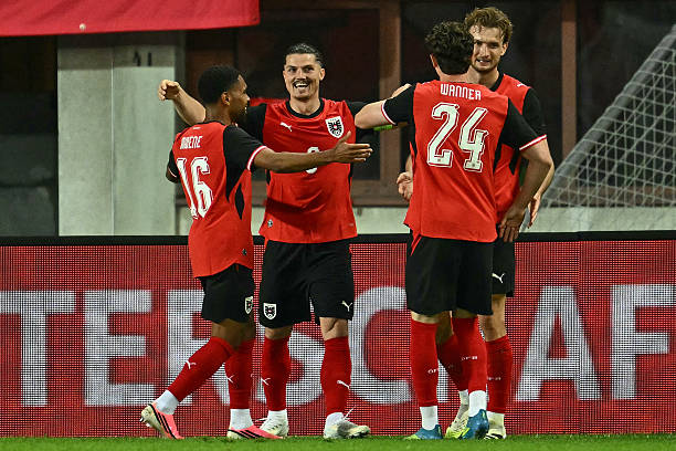 Austria's forward #09 Marcel Sabitzer (2nd L) celebrates scoring the opening goal with his teammates during the friendly football match between Austria and Tunisia in Vienna, Austria on June 1, 2026 ahead of the 2026 FIFA World Cup football tournament.