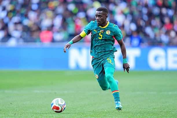 PARIS, FRANCE - MARCH 28: Idrissa Gana Gueye of Senegal runs with the ball during the international friendly match between Senegal and Peru at Stade de France on March 28, 2026 in Paris, France.