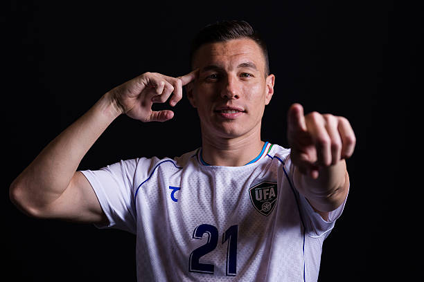 ATLANTA, GEORGIA - JUNE 11: (EXCLUSIVE COVERAGE) Igor Sergeev #21 of Uzbekistan poses for a portrait during the official FIFA World Cup 2026 portrait session on June 11, 2026 in Atlanta, Georgia.