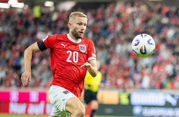 Austria's midfielder #20 Konrad Laimer eyes the ball during the during the 2026 World Cup qualifiers Europe zone group H football match between Austria and Cyprus, on September 6, 2025 in Linz, Austria.