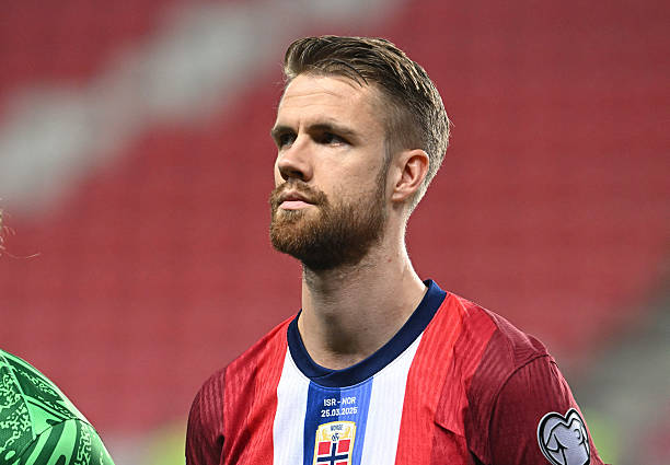 Norway's midfielder #03 Kristoffer Ajer lines up for the national anthems prior to the 2026 World Cup Group I qualifier football match between Israel and Norway in Debrecen, Hungary, on March 25, 2025.