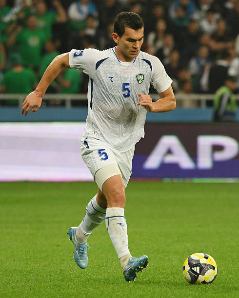TASHKENT, UZBEKISTAN - MARCH 30: Rustam Ashurmatov of Uzbekistan runs with the ball during the international friendly match between Uzbekistan and Venezuela on March 30, 2026 in Tashkent, Uzbekistan.