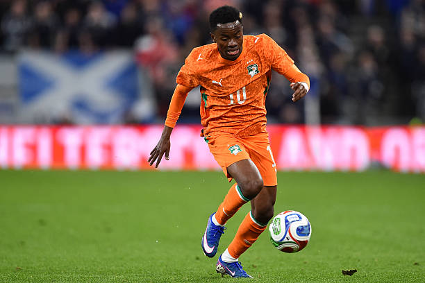 Ivory Coast's forward #10 Simon Adingra runs with the ball during the friendly international football match between Scotland and Ivory Coast at the Hill Dickinson Stadium in Liverpool, north west England on March 31, 2026.