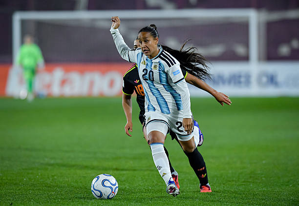 BUENOS AIRES, ARGENTINA - JUNE 5: Dalila Ippolito of Argentina runs with the ball against Khloe Olano of Peru during the CONMEBOL Women's Nations League match between Argentina and Peru at Estadio Ciudad de Lanus Nestor Diaz Perez on June 5, 2026 in Buenos Aires, Argentina.