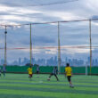 Members of an amateur football club play mini soccer on the rooftop of a traditional market building in Jakarta, Indonesia, on March 9, 2025. The growing trend of sports and healthy lifestyles in major Indonesian cities, especially Jakarta, has driven the expansion of sports facilities and infrastructure. Several old buildings, including previously vacant traditional markets, have been renovated and converted into mini soccer, futsal, and badminton courts.